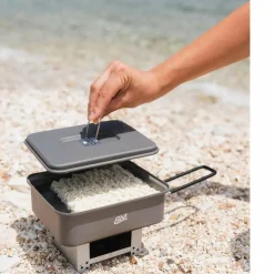 Discount TASCHENKOCHER MIT WINDSCHUTZ INKL. 2X27G TROCKENBRENNSTOFFTA Campingkocher